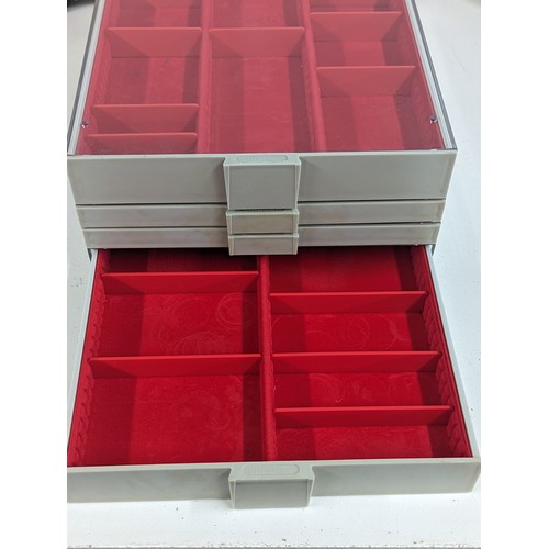 225 - A Lindner Coin/Collectors stackable trays, housing various sized red felt lined inserts,
Location: 8... 