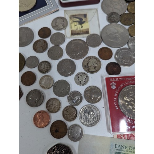 228 - World Coins - A collection comprising of USA Buffalo Nickels, Mercury Dimes, and others along with, ... 