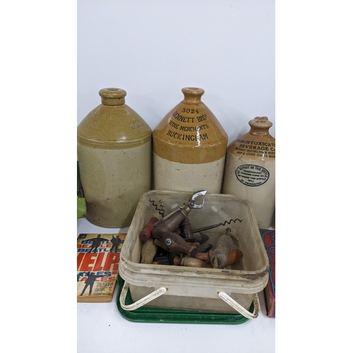 208 - A mixed lot to include boxed Escalado stoneware flagons, corkscrews and various books
Location: 8-5