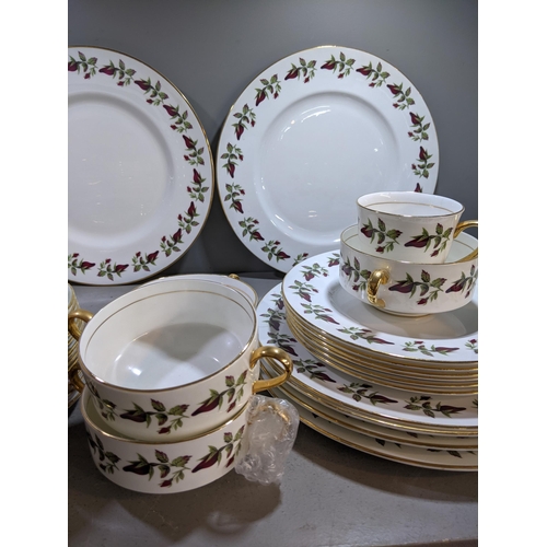 287 - A Shelley 'Wild Roses' part dinner service comprising dinner plates, side plates cups and saucers, s... 