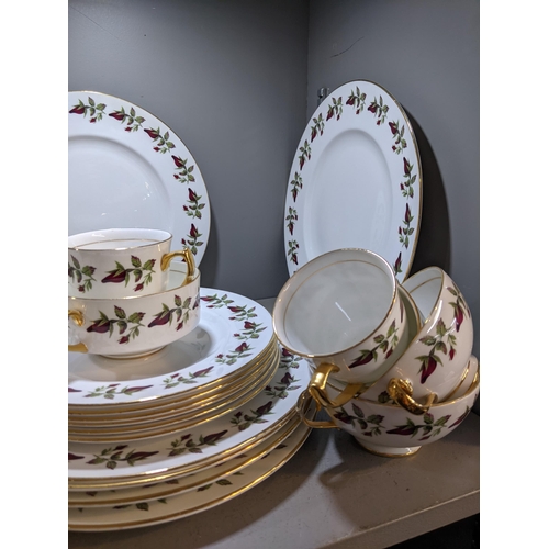 287 - A Shelley 'Wild Roses' part dinner service comprising dinner plates, side plates cups and saucers, s... 