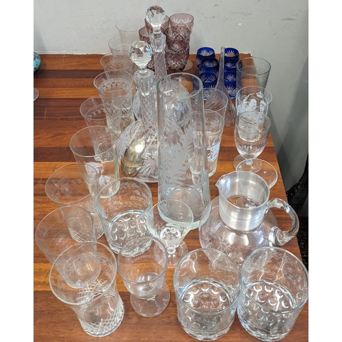 293 - Mixed 19th century and later glassware to include a pair of Victorian etched glass decanters, commem... 