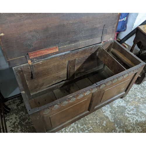 299 - An 18th century oak chest with a later top Location: G