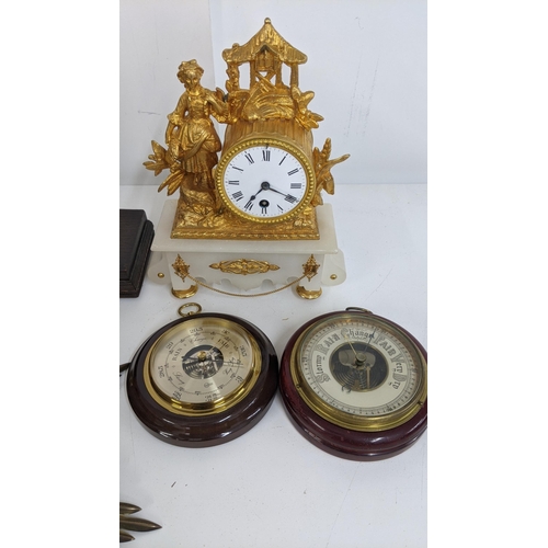 404 - A mixed lot to include a Neapolitan style hat clock, a Sunburst wall clock, two barometers and one o... 