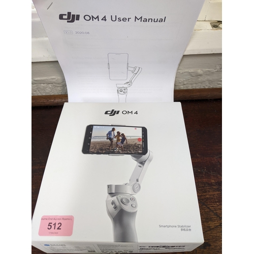 512 - DJI Smart phone gimble boxed Location: G