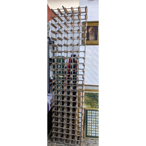 514 - A tall wood and metal wine bottle rack Location: G