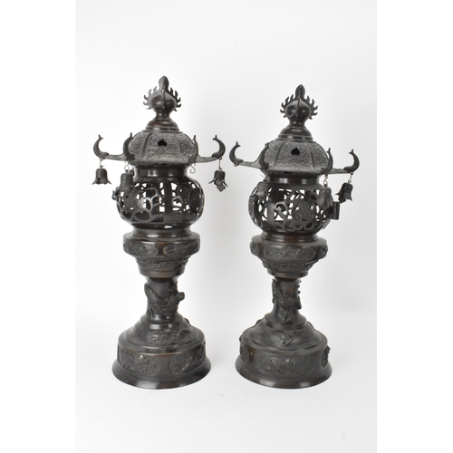 10 - A pair of Japanese Meiji period bronze koros in the form of temples with pagoda roof with bells, ret... 