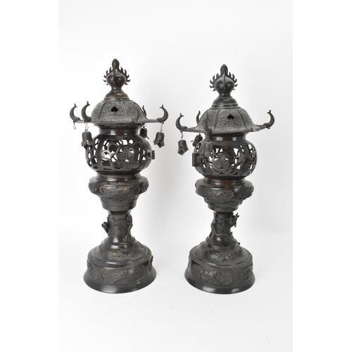 10 - A pair of Japanese Meiji period bronze koros in the form of temples with pagoda roof with bells, ret... 