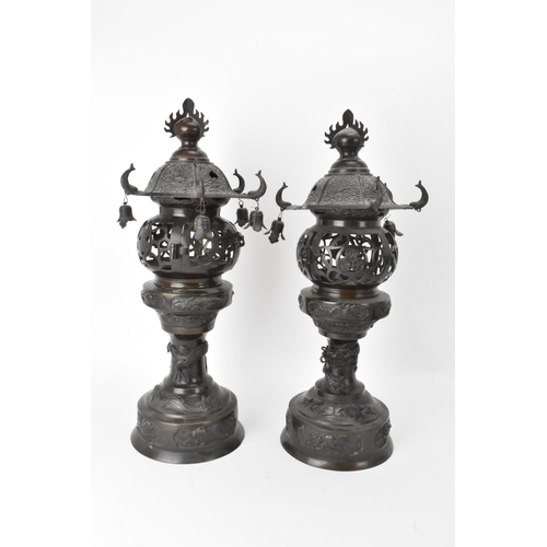 10 - A pair of Japanese Meiji period bronze koros in the form of temples with pagoda roof with bells, ret... 