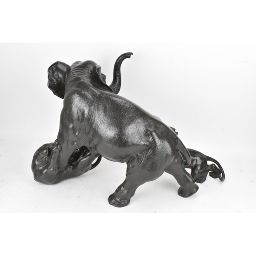 111 - A Japanese Meiji period bronze group modeled as an elephant being attacked by three Siberian tigers,... 