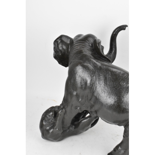 111 - A Japanese Meiji period bronze group modeled as an elephant being attacked by three Siberian tigers,... 