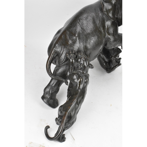 111 - A Japanese Meiji period bronze group modeled as an elephant being attacked by three Siberian tigers,... 