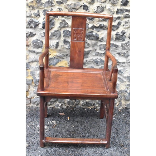 122 - A pair of 20th century Chinese Ming style hardwood armchairs, with curved top rail and curved centra... 