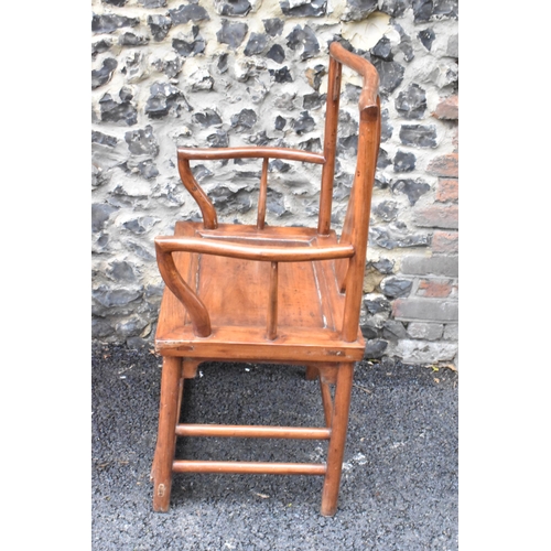 123 - A pair of 20th century Chinese Ming style hardwood armchairs, with curved top rail and curved centra... 