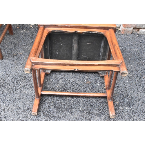 123 - A pair of 20th century Chinese Ming style hardwood armchairs, with curved top rail and curved centra... 