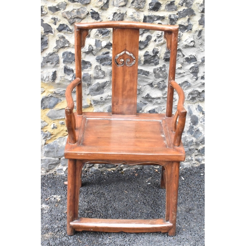 123 - A pair of 20th century Chinese Ming style hardwood armchairs, with curved top rail and curved centra... 