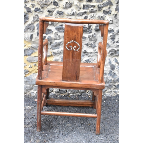 123 - A pair of 20th century Chinese Ming style hardwood armchairs, with curved top rail and curved centra... 