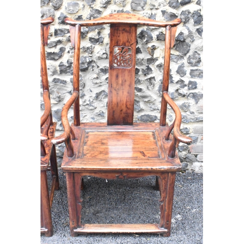 124 - A pair of 20th century Chinese Ming style yoke back hardwood armchairs, with curved top rail and cur... 