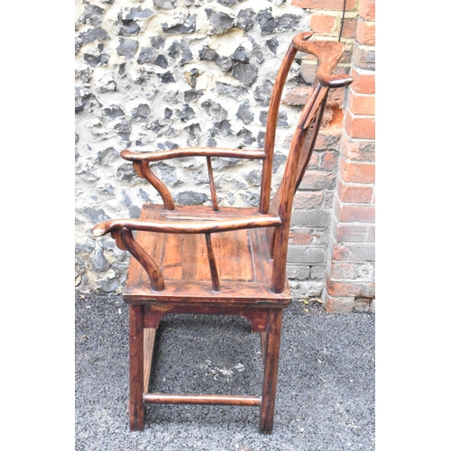 124 - A pair of 20th century Chinese Ming style yoke back hardwood armchairs, with curved top rail and cur... 