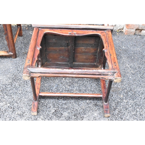 124 - A pair of 20th century Chinese Ming style yoke back hardwood armchairs, with curved top rail and cur... 