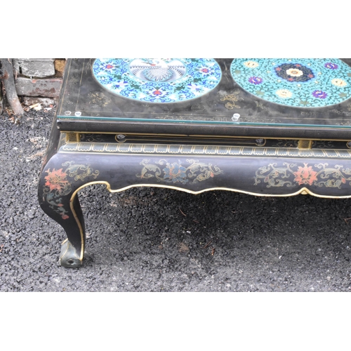 125 - A Chinese 20th century cloisonne coffee table, the black  lacquered low coffee table with a rectangu... 