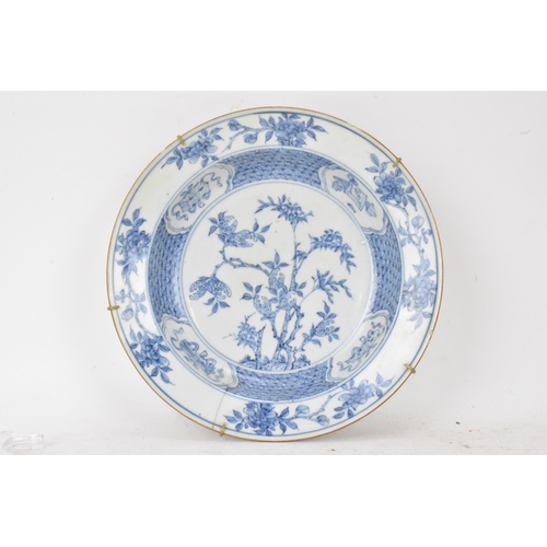 129 - A Chinese Qing dynasty bowl, 18th century, blue and white underglaze decoration depicting bamboo tre... 