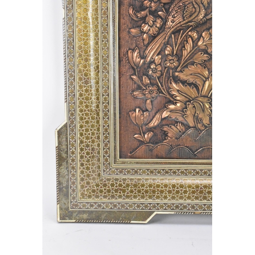 133 - An early/mid 20th century Iranian katamkari wall hanging frame, the stepped moulded frame profusely ... 