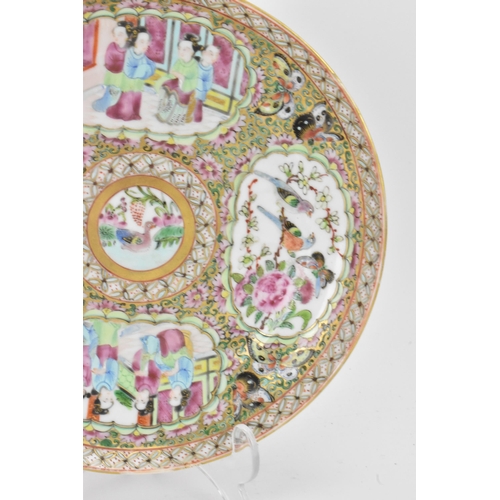 135 - A pair of Chinese export late 19th century Canton Famille Rose porcelain plates, in polychrome ename... 