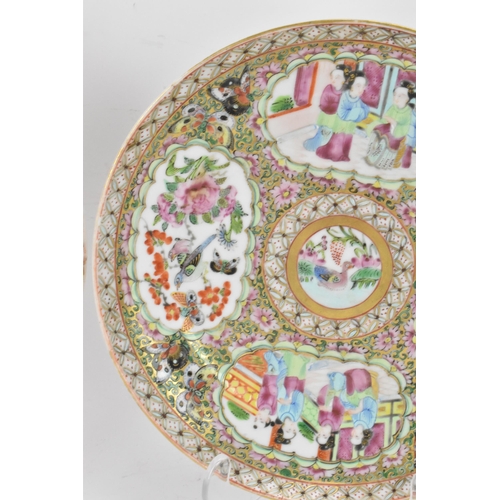 135 - A pair of Chinese export late 19th century Canton Famille Rose porcelain plates, in polychrome ename... 