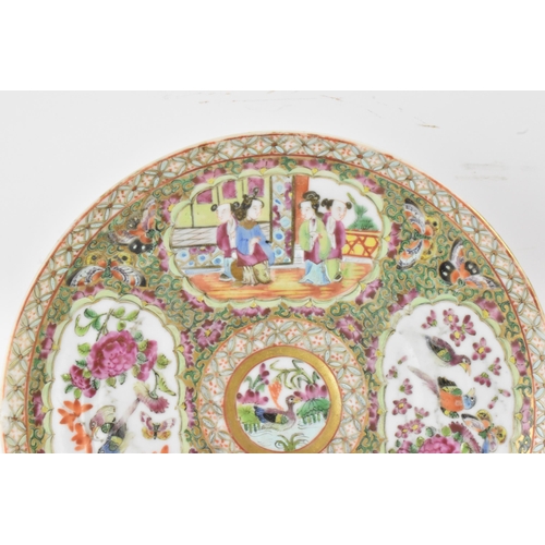 135 - A pair of Chinese export late 19th century Canton Famille Rose porcelain plates, in polychrome ename... 