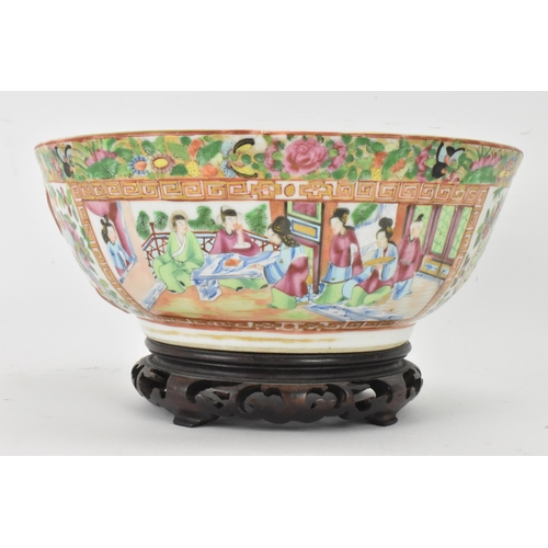 136 - A Chinese export late 19th century Canton Famille Rose bowl, in polychrome enamels, the exterior dec... 