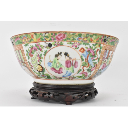 136 - A Chinese export late 19th century Canton Famille Rose bowl, in polychrome enamels, the exterior dec... 