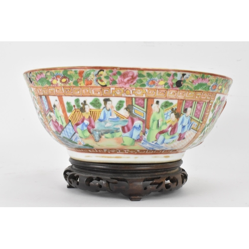 136 - A Chinese export late 19th century Canton Famille Rose bowl, in polychrome enamels, the exterior dec... 