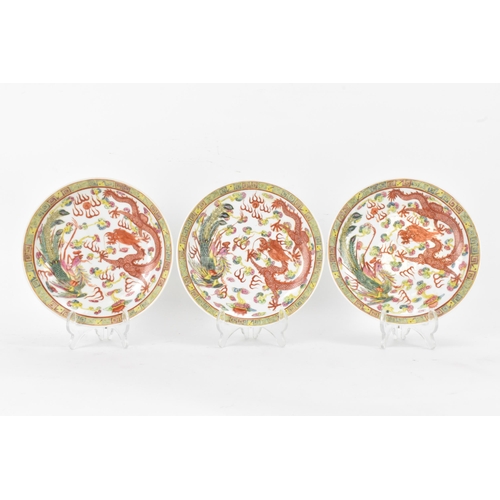 143 - A set of three Chinese Qing dynasty, Guangxu period, famille rose bowls, decorated in polychrome ena... 