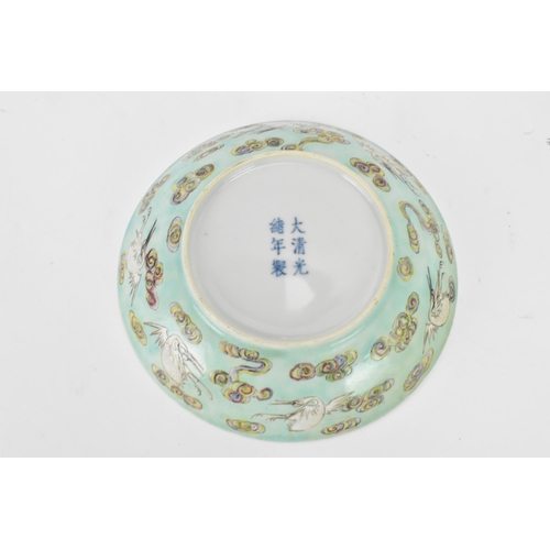 143 - A set of three Chinese Qing dynasty, Guangxu period, famille rose bowls, decorated in polychrome ena... 