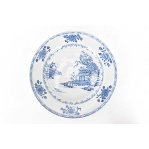 145 - A Chinese 18th century, Qianlong, Nanking cargo blue and white plate, in boatman and six flowers des... 