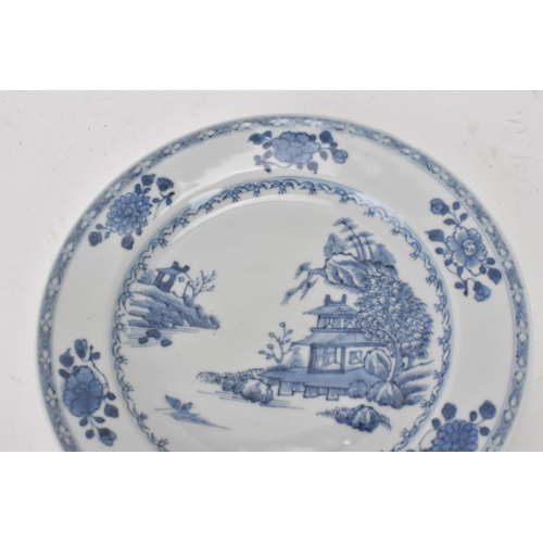 145 - A Chinese 18th century, Qianlong, Nanking cargo blue and white plate, in boatman and six flowers des... 