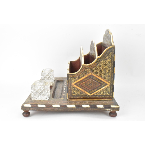 147 - A Persian late Qajar dynasty letter rack, the profusely inlaid frames having micro-mosaic inlaid for... 