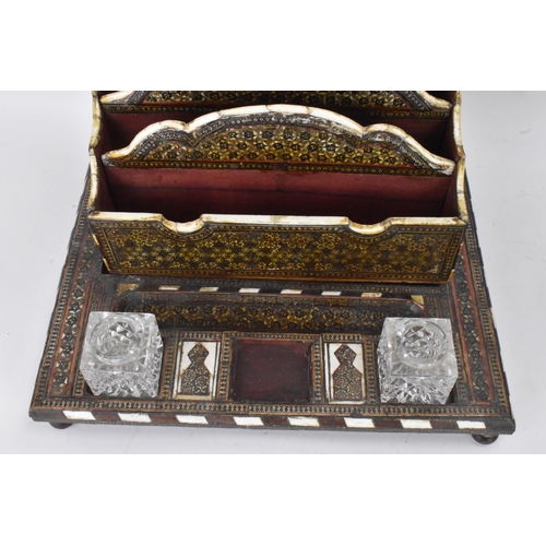 147 - A Persian late Qajar dynasty letter rack, the profusely inlaid frames having micro-mosaic inlaid for... 