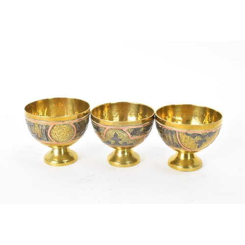 148 - A 19th century Islamic Cairoware mamluk revival brass coffee/tea service, consisting of a tray 31.5c... 