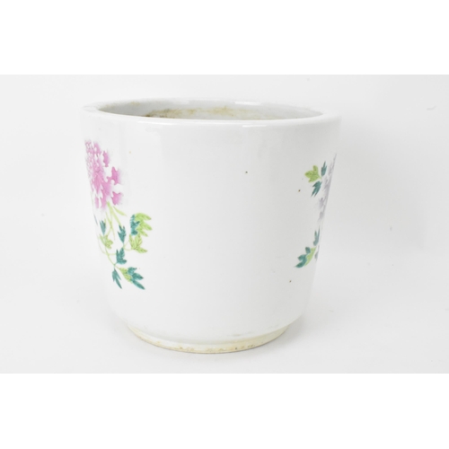 15 - A Chinese late Qing dynasty porcelain Famille Rose planter, of cylindrical slightly tapering form de... 