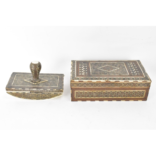 150 - A Persian late Qajar dynasty ink blotter and rectangular formed cigarette box, both profusely decora... 