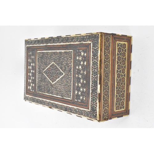 150 - A Persian late Qajar dynasty ink blotter and rectangular formed cigarette box, both profusely decora... 