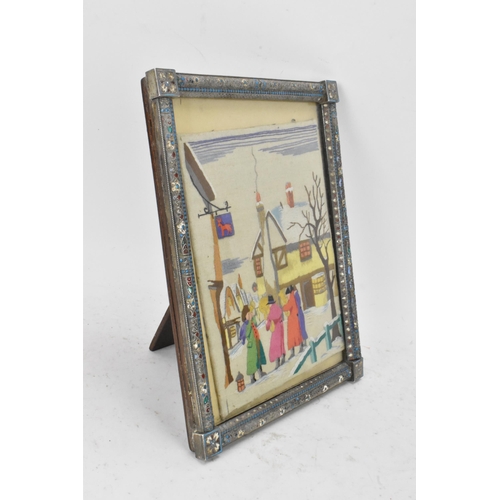 153 - A Russian silver early 20th century champleve enamel photograph frame, inset with a tapestry and bor... 