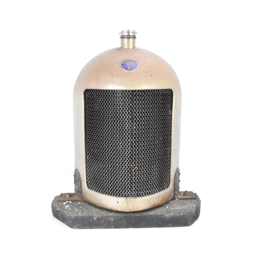 156 - A Morris Cowley 'Bullnose' radiator, circa 1920s, nickel plated surround with blue enamel badge, a O... 