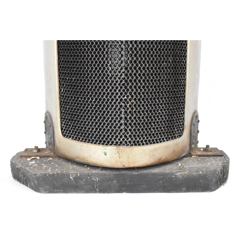 156 - A Morris Cowley 'Bullnose' radiator, circa 1920s, nickel plated surround with blue enamel badge, a O... 