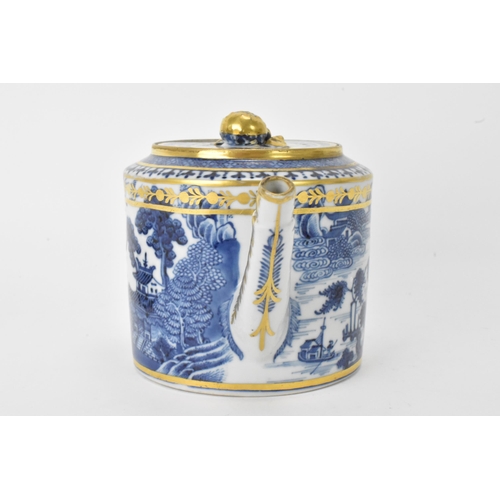 17 - A Chinese export Qing dynasty blue and white teapot and stand, late 18th century, decorated with bui... 