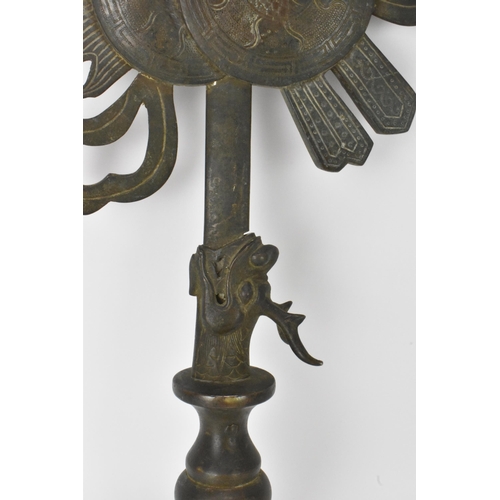 19 - A Chinese gilt metal ceremonial staff mount, the blade, issuant from a dragon's mouth and the vase-f... 