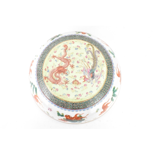 219 - Two Chinese famille rose circular formed lidded boxes, early 20th century, decorated in polychrome e... 