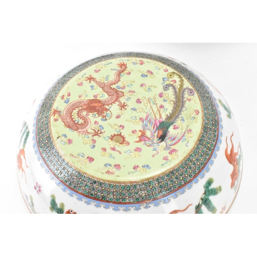 219 - Two Chinese famille rose circular formed lidded boxes, early 20th century, decorated in polychrome e... 